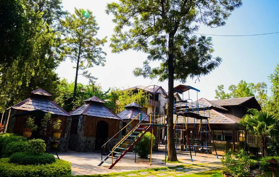 Cottages beside the children's play area at the resort