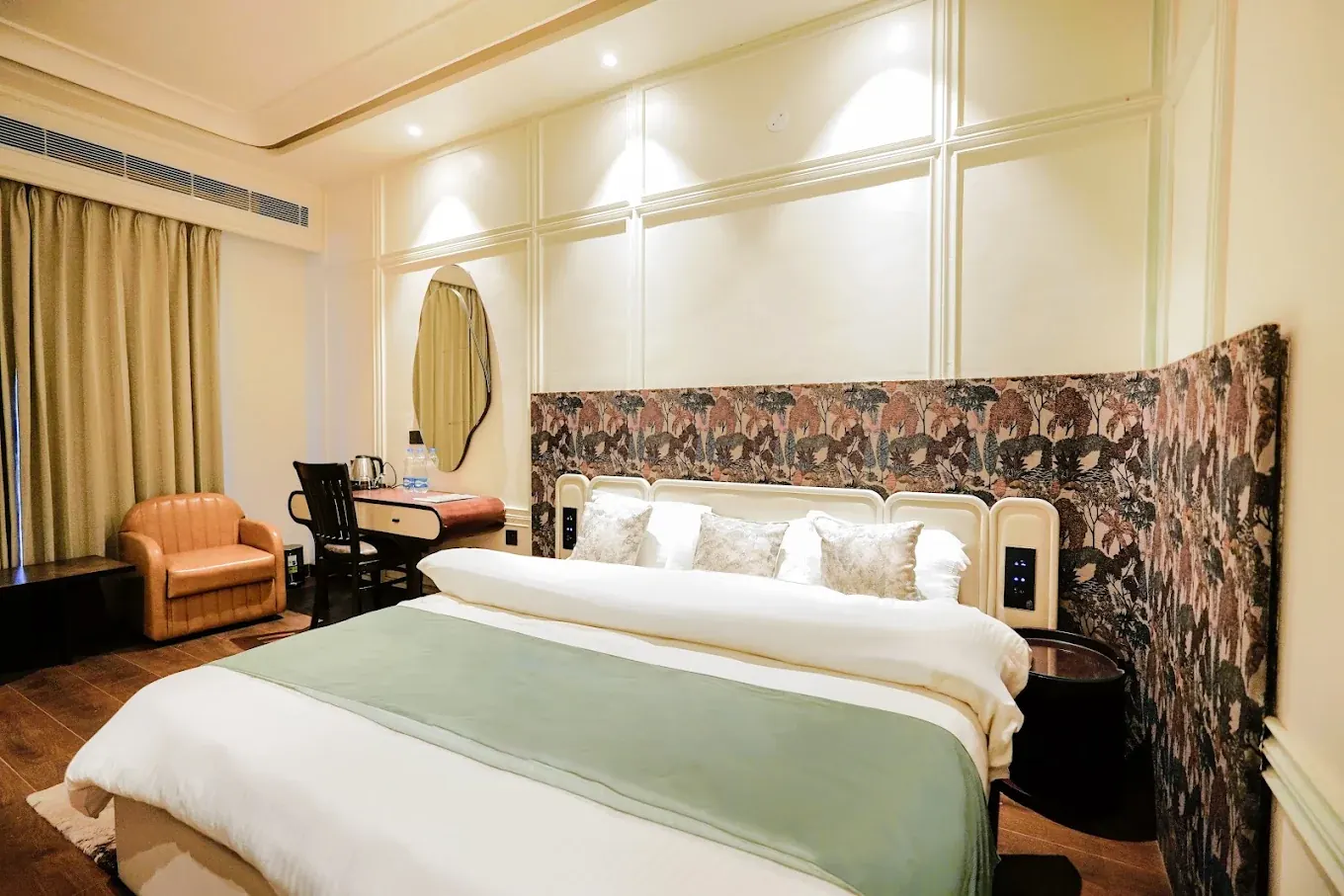 Premium room with king bed and printed headboard
