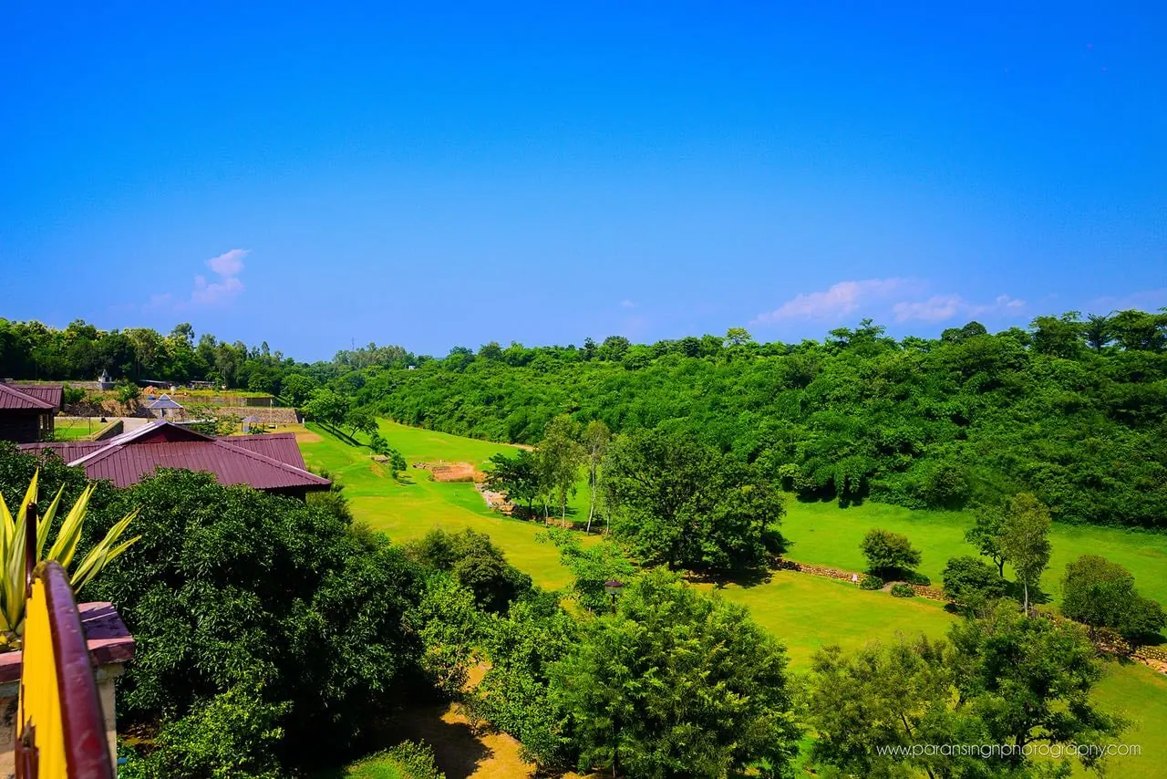 Panoramic view of green valley and hills from the resort